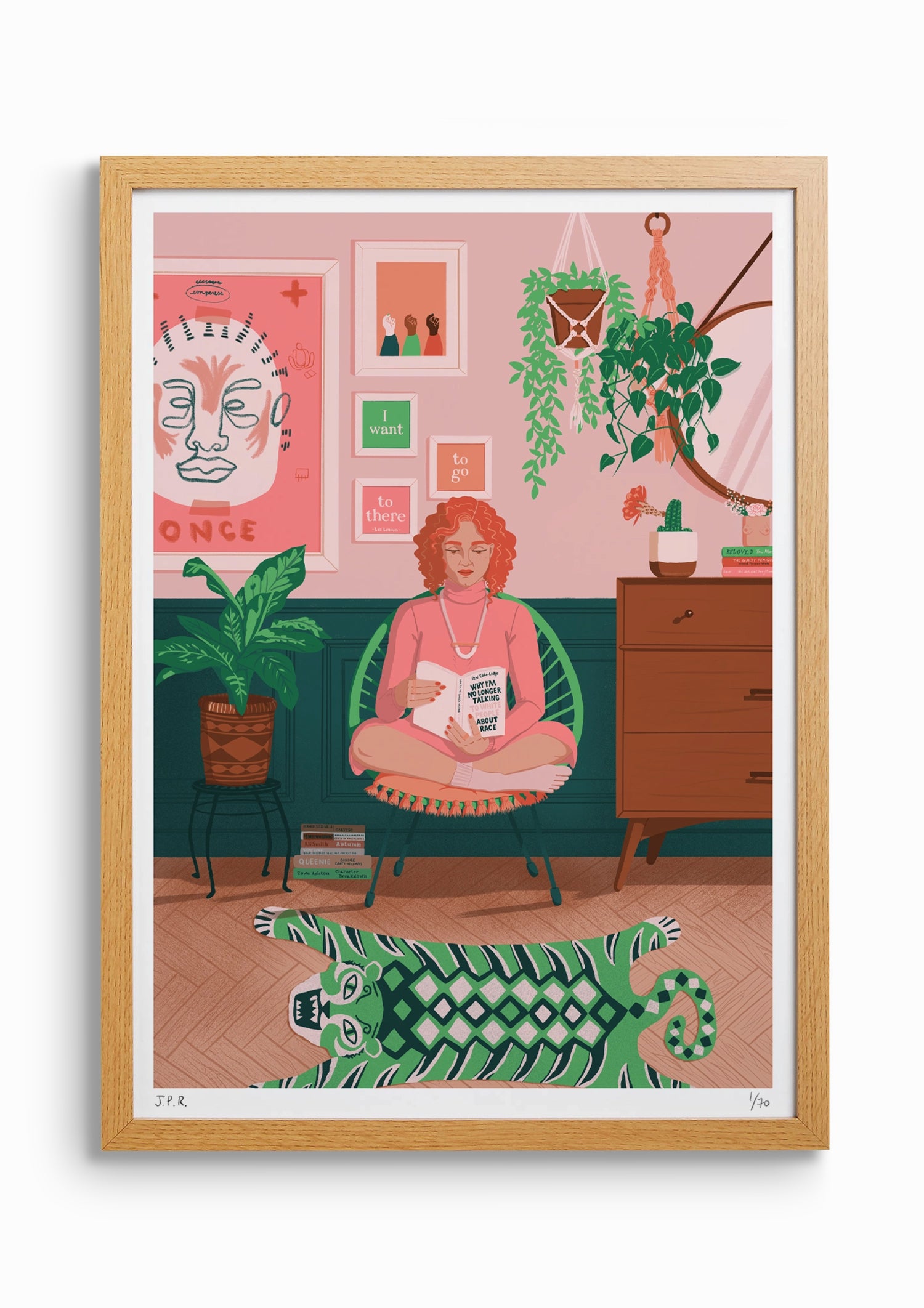Framed illustration of a White woman reading the book Why I'm No Longer Talking To White People About Race by Reni Eddo-Lodge. She is sat in her pink and green living room, surrounded by plants and books