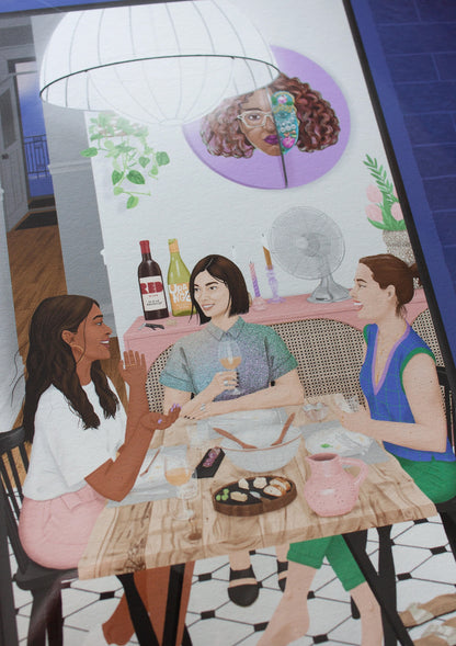 Close-up on an illustration of three women around the dinner table, chatting and laughing. One is White, one is South Asian, and the other one is East Asian. Remnants of food are on the table. There is a fan next to them, to help with the heat. Both the back and the front door of the flat are opened and it's nighttime.